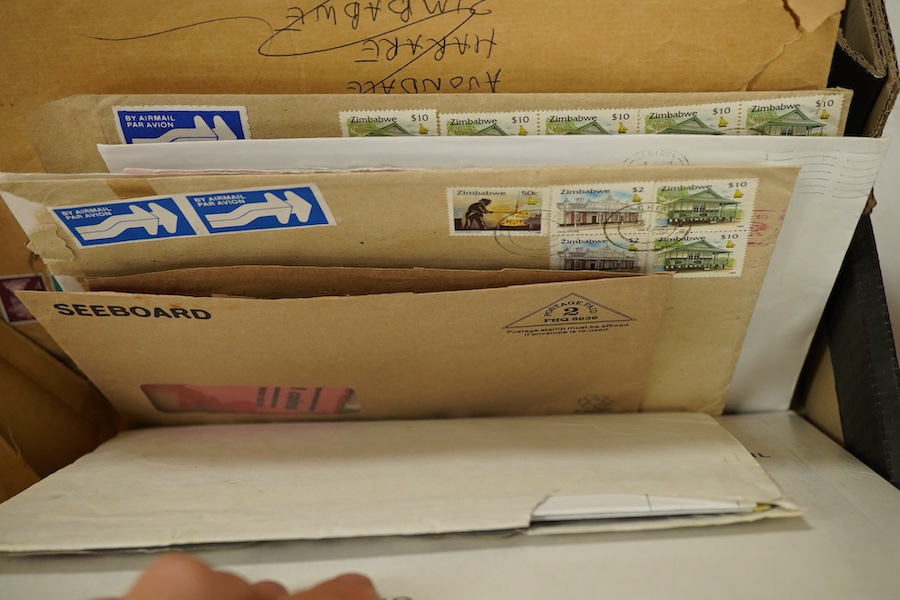 A collection of Royal Mail QEII first day covers and mint presentation packs and various loose stamps